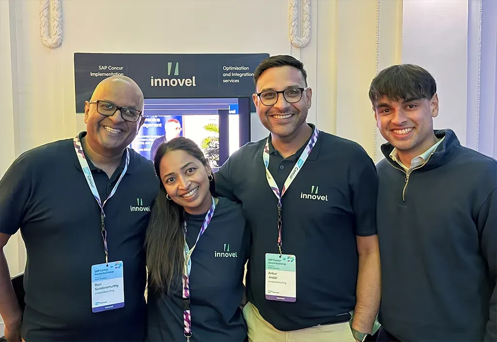 The Innovel team, including founders Ravi Sundaramurthy and Ankur Jindal, on the Innovel stand at an SAP Concur event